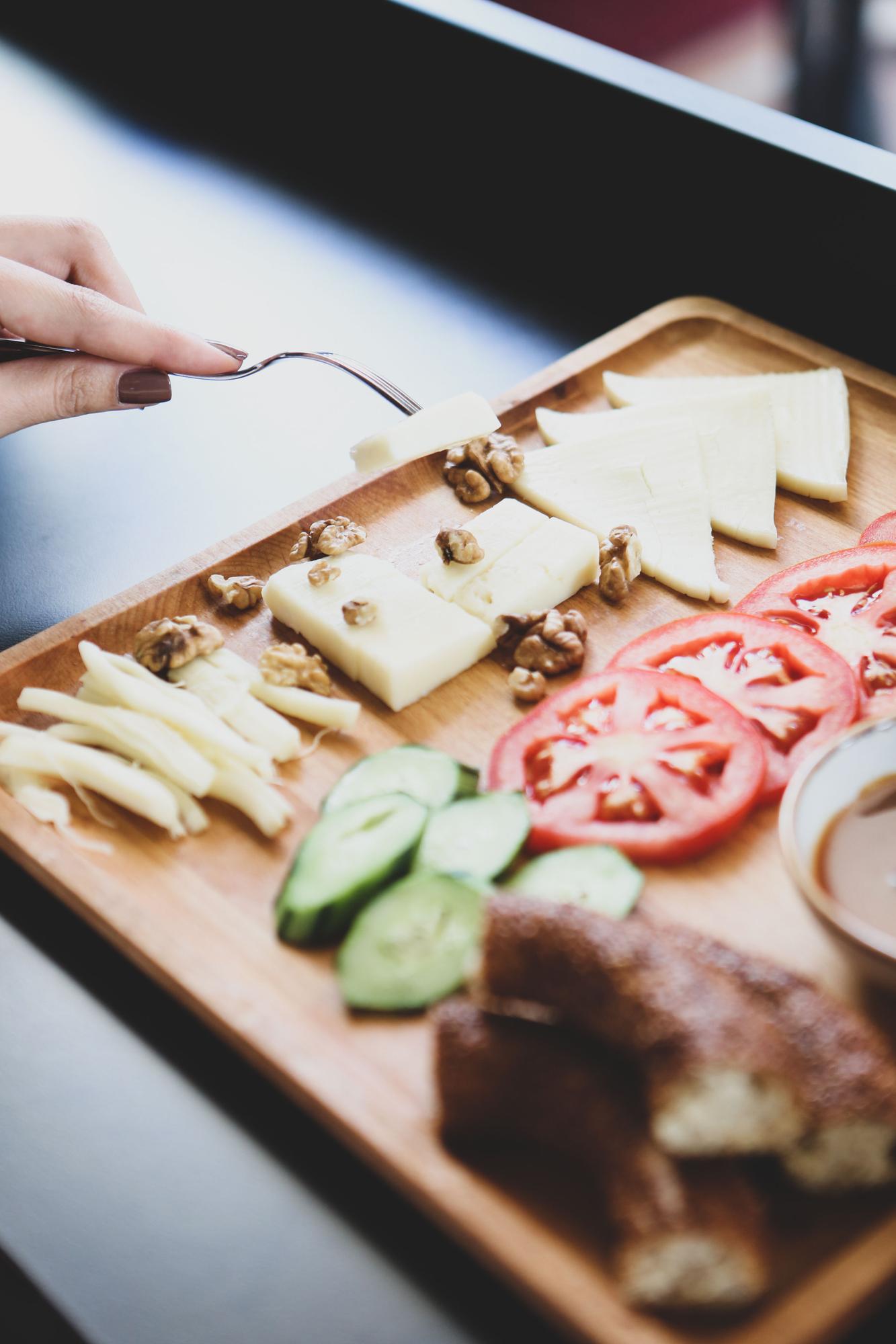 Chef arranging charcuterie board